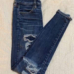Distressed high rise/waist jegging